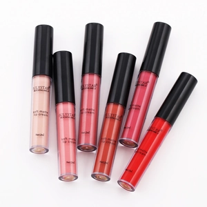 Set of six soft matte lip creams in shades from nude pink to deep red on white background