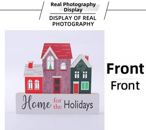 Macro detail of wooden Christmas house ornaments with Home for the Holidays greeting