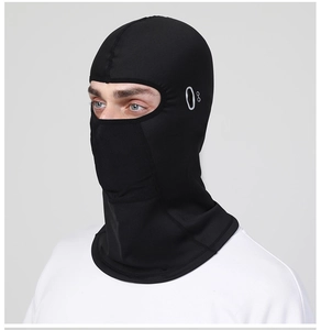 Detail of black cycling balaclava featuring breathable mesh and ergonomic thermal fabric