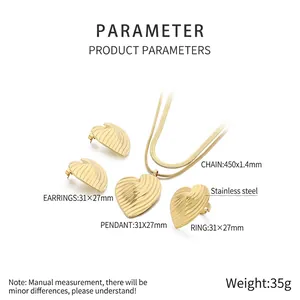 Detailed view of 18K gold stainless steel jewelry set with textured heart designs