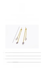 Detailed view of 8.2cm long 18K gold plated tassels with natural baroque pearls