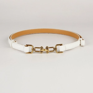 Detailed view of white slim leather belt with golden horsebit buckle and tan lining