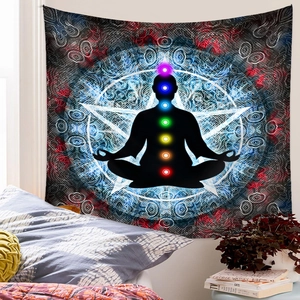 Detail showing a seven chakra meditation tapestry with mandala art in a cozy bedroom setting