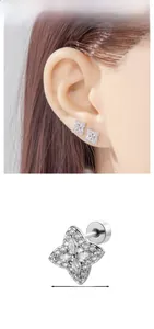 Detail view of silver flower cartilage stud with marquise cubic zirconia and screw back