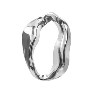 Macro shot of 304 stainless steel oval ring with irregular wavy texture and polished finish