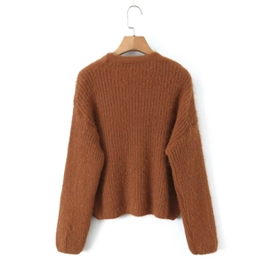 Rear view of brown mohair cardigan featuring fuzzy knit texture on wooden hanger