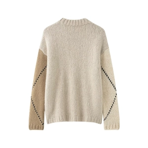 Women's diamond pattern knit sweater with asymmetric colorblock sleeves and drop shoulders