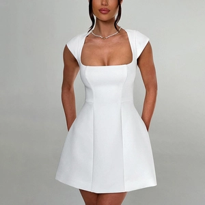 Detailed view of the square neck design and cap sleeves on a white A-line mini dress