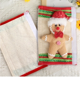 Detail of Christmas gingerbread man handle cover with sequins and velcro closure