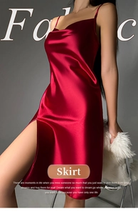 Detailed close-up of red satin silk nightgown featuring a high side slit and elegant texture