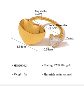 Detail view of gold stainless steel ring with zircon heart and size measurements