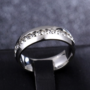 Macro shot of 6mm 316L stainless steel ring with inlaid clear cubic zirconia crystals