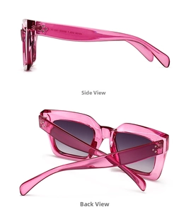 Detail of trendy rose pink square sunglasses with smoke gradient lenses and dual rivets