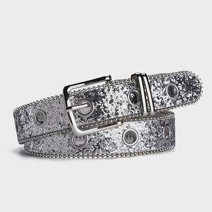 Sparkling silver sequin belt with metal eyelets and a classic square buckle for women