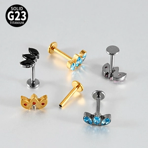 Macro view of G23 titanium labret studs with marquis cut zircon and flat back base