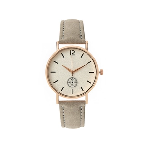 Minimalist women's quartz watch with rose gold case and taupe suede leather strap