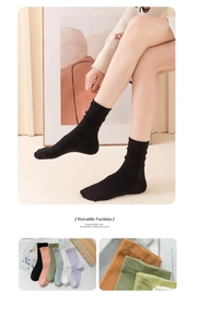 Close-up of soft breathable cotton socks in multiple colors with high-stretch loose cuffs