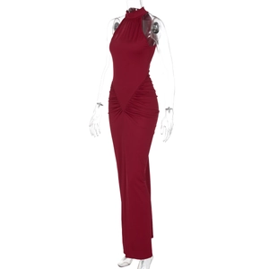 Detailed view of wine red ruched maxi dress featuring a high halter neck and side pleats