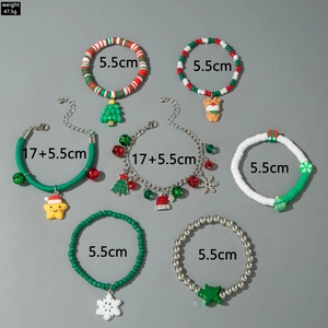 Detailed view of 7 Christmas bracelets featuring Santa, reindeer and snowman charms