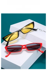 Detail of vintage rectangular sunglasses in black with yellow lenses and red with grey lenses