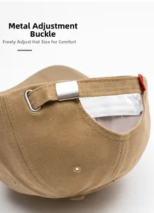 Detail of the khaki baseball cap featuring a premium metal buckle for size adjustment