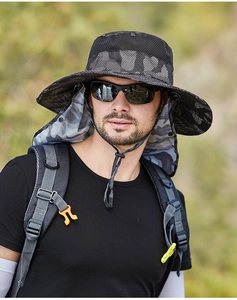 Detail of outdoor sun hat with black mesh and grey camouflage neck protector flap