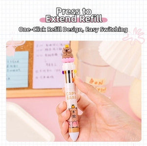 Detail showing 10-color capybara retractable ballpoint pen with a 3D cartoon topper