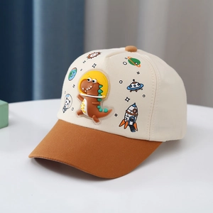 Detail of child baseball cap with 3D silicone dinosaur and space-themed prints