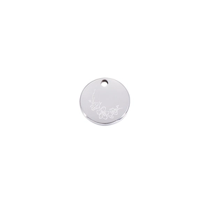 Macro detail of silver stainless steel round pendant with engraved floral birth flower pattern