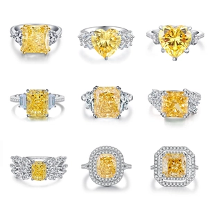 Detailed macro view showing nine different Radiant and Heart cut yellow diamond rings