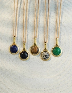 Detailed set of five vintage gold necklaces featuring lapis, tiger eye and malachite pendants