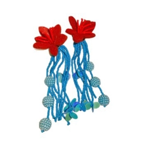 Chic floral earrings with red fabric flowers and blue beaded tassels on white background