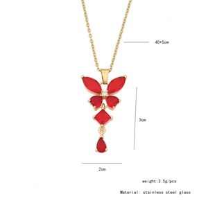 Detail showing dimensions of butterfly tassel necklace with red gemstone and gold chain