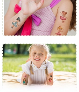 Detail of waterproof ballet princess tattoos on a child wrist and girl playing outdoors