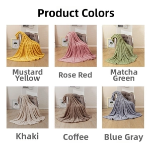 Detail showing 3D wave textured flannel blankets in six elegant solid colors