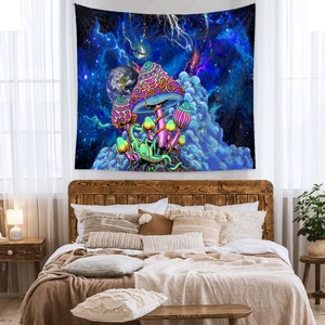 Psychedelic mushroom and galaxy tapestry hanging above bed in a cozy bedroom decor