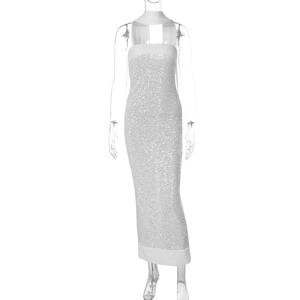 Close-up of shimmering silver sequins on long strapless bodycon dress for women