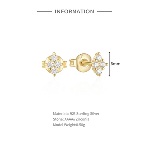 Macro detail of S925 hallmark on gold plated sterling silver diamond flower stud earrings