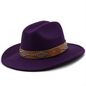 Detail of deep purple wool fedora with brown leather band and silver metal rivets