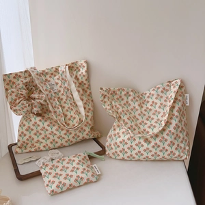 Floral cotton shoulder bag set with tote, pouch, and hair accessories in vintage orange print
