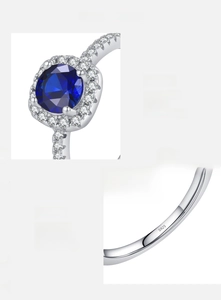 Detailed view of S925 sterling silver stamp and blue halo zircon setting on the ring