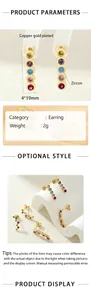 Detailed macro view of colorful zircon stones set in gold-plated earrings, 4x19mm size