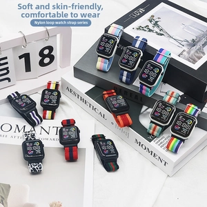 Detail view of various colorful nylon loop straps on a square LED digital sports watch