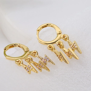 Chic 18K gold plated hoop earrings with three pink zircon lightning pendants on white fabric