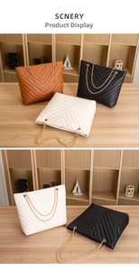 Detailed view of quilted tote bags in black, brown and white with gold chain straps