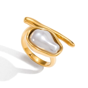 Elegant 18K gold plated stainless steel open ring with a large baroque pearl on white background