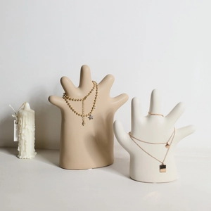 Minimalist ceramic hand-shaped jewelry display stand for rings and necklaces