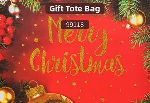 Close-up of extra large Christmas gift bag made of coated paper with golden lettering