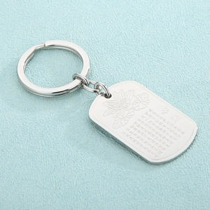Detailed engraving of Lotus flower and Heart Sutra on stainless steel silver keychain