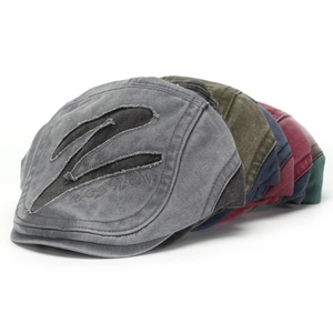Detail of vintage washed cotton flat caps with Z embroidery and Boston letter stitching